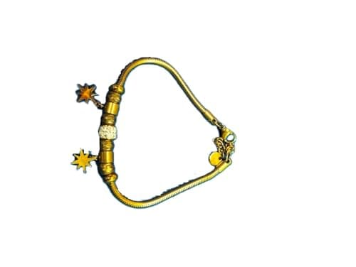 Gold-toned chain and two dangling star shaped charms. Bracelet