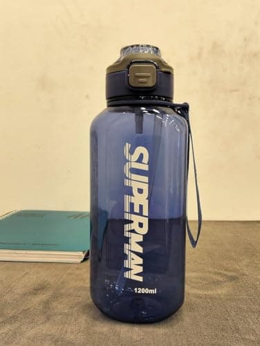 Generic Sports Water Bottle, 1200ml Capacity, Navy Blue,Stay Hydrated During Workouts or Travel, Lightweight and Easy to Carry for Daily Use.