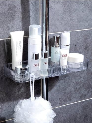 Generic Holder for shampoos, creams, and bathroom essentials; also features a showerhead holder and a hook for a loofah. Made of acrylic with double-sided adhesive backing, .sa Caddy