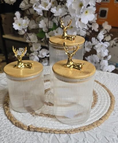 Generic Glass canister set with wooden lids,Suitable for the kitchen and dining area,Ideal for serving nuts, candy, and snacks,3 different sizes:630ml, 760ml, 950ml,Imported product, .em Food storage container