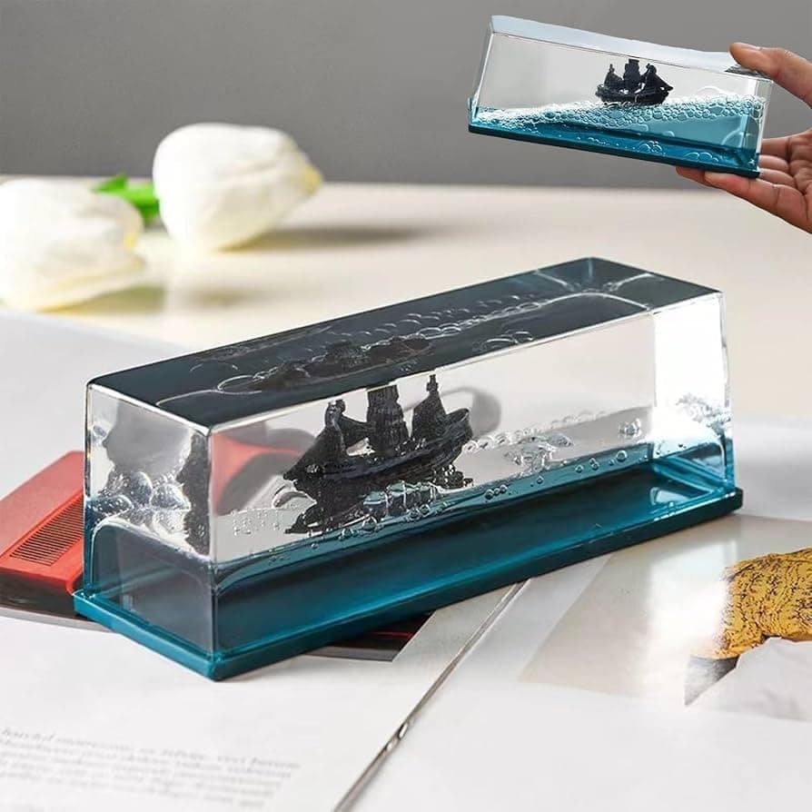 Generic Decorative Black Ship in Bottle with Blue Liquid Wave Display, Desktop Nautical Decor Sculpture