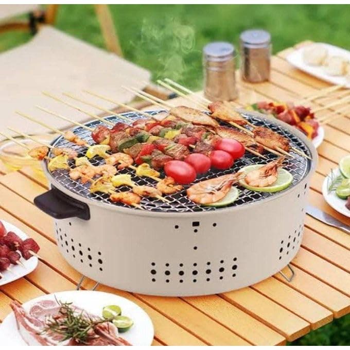 Portable Round Charcoal Grill with Folding Legs and Stainless Steel Cooking Mesh for Indoor and Outdoor BBQ Parties Includes Essential Grilling Tools Barbecue grill