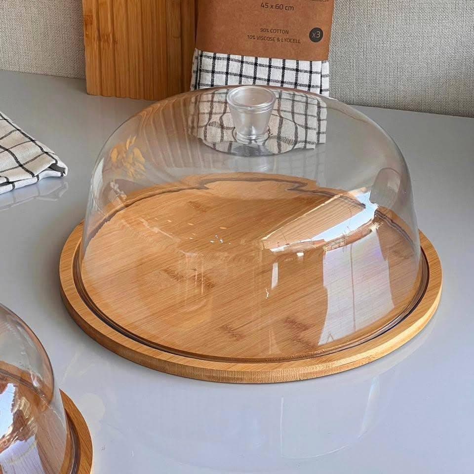 Generic Round cake stand with an acrylic cover and acrylic handle, Natural bamboo wood base (2 cm thick), Easy to clean, Imported, Dimensions: 31 x 31 cm, .nin