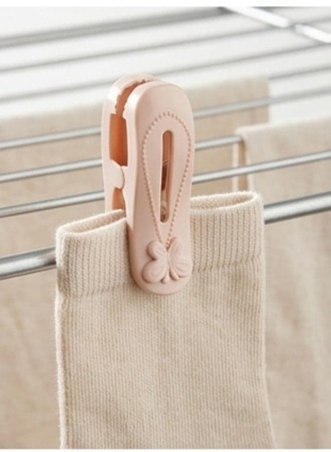 Stylish butterfly-patterned clothes pegs - specially designed to hold laundry securely without leaving unwanted marks on thick fabrics for drying clothes and linens - versatile for home, office, and room decor - 12 pieces Clothes Drying Clips (٢)