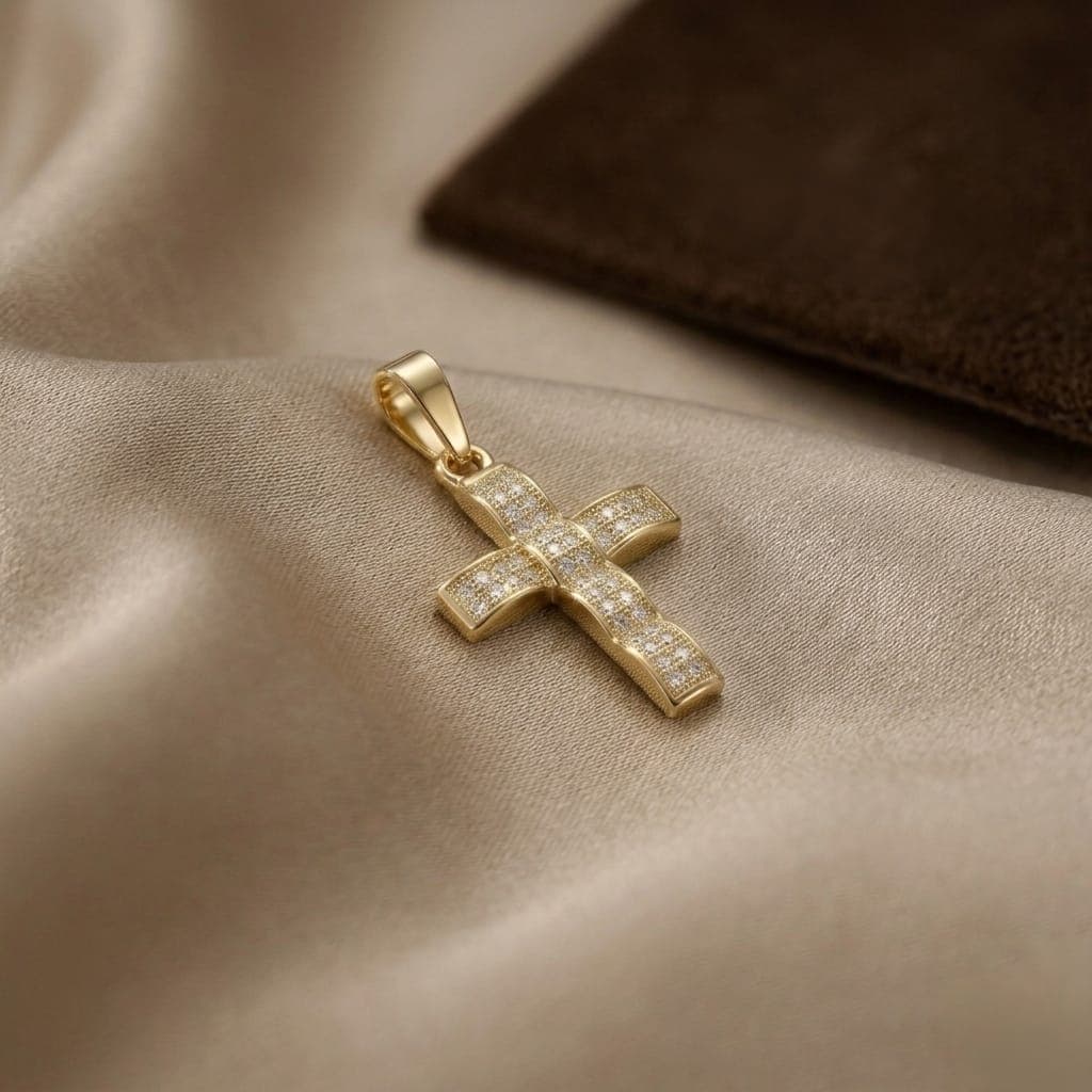 A cross pendant (without chain) in elegant gold, featuring a prominent design and fully studded with fine zircon stones that give you an exceptional sparkle that catches the eye at all times. Women's Necklaces (4)