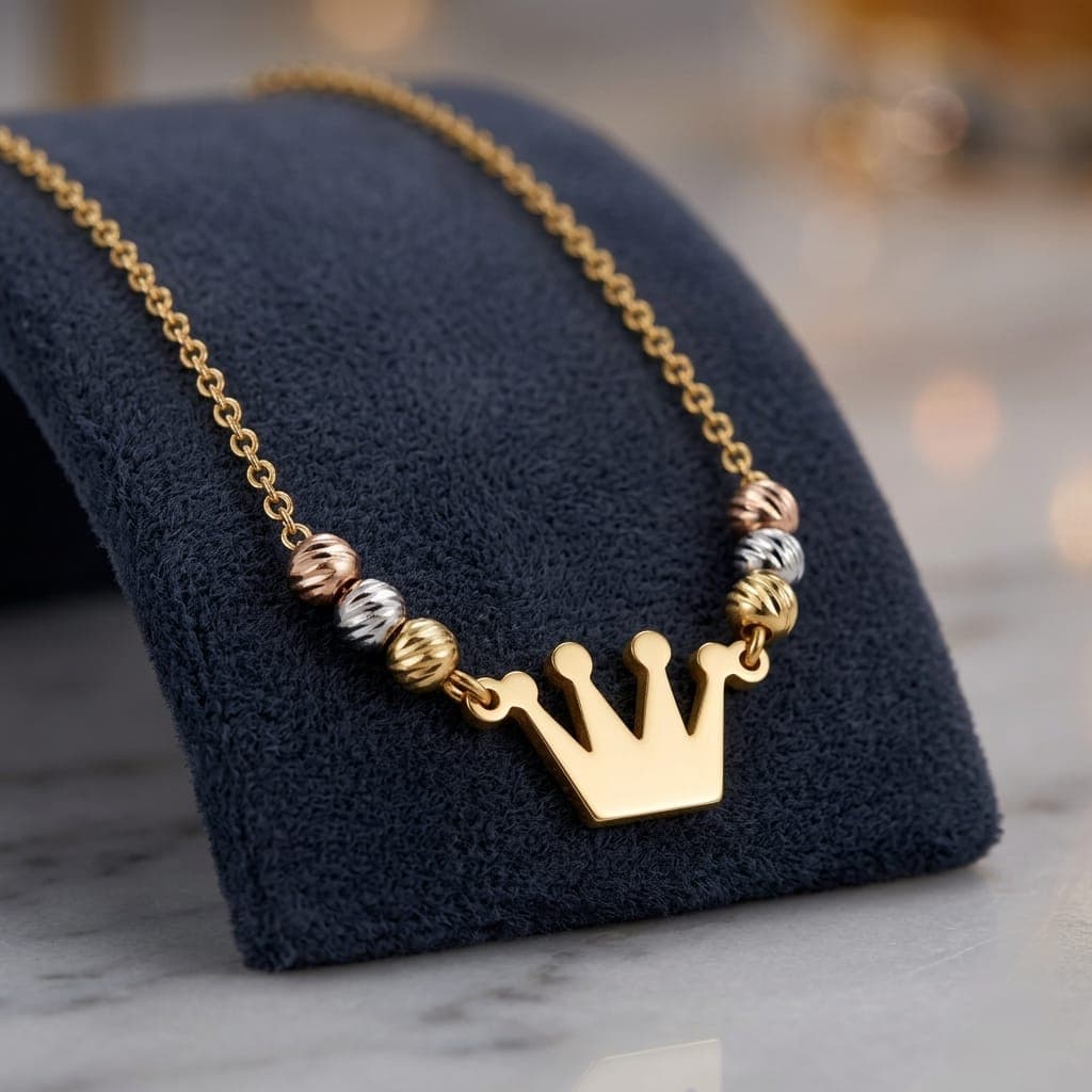 A regal necklace adorned with a gold crown pendant and colorful beads in a luxurious design, giving you a touch of elegance and distinction. It features an adjustable clasp for a perfect fit. Women's Necklaces (٧)