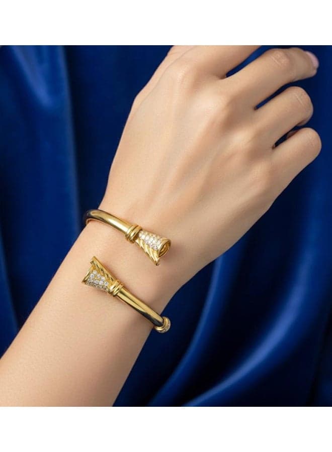 An open gold bracelet, adorned with two cone-shaped heads studded with sparkling zircon stones for an eye-catching shine with every movement. Women's Bracelets & Bangles (6)
