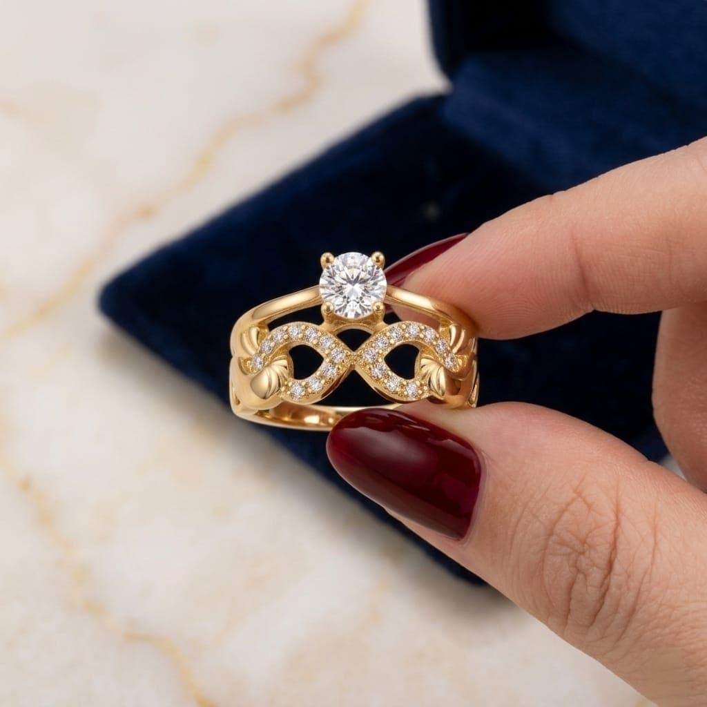 An elegant gold ring, sparkling with a dazzling central stone. With its intricate infinity design, carefully set with brilliant zircon stones, it adds allure and luxury to your look. Women's Rings (٥)