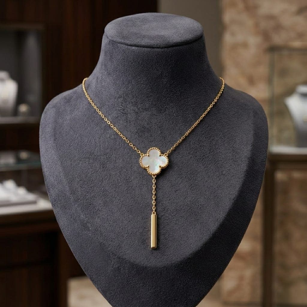 An elegant gold necklace made of rust-resistant stainless steel, with a unique design that combines a delicate shell rose and an attractive rectangular elongated pendant, with an adjustable clasp to suit you. Women's Necklaces (6)
