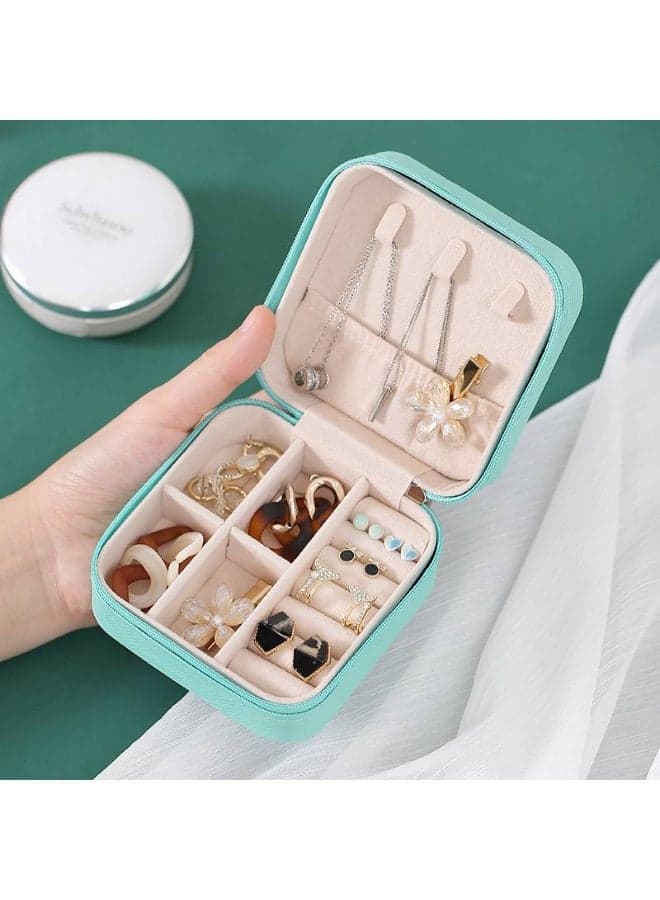 This box features a square, compact design, and is often made of polyurethane (PU) leather on the outside and a soft velvet lining on the inside to protect jewelry from scratches. Jewellery Organizers