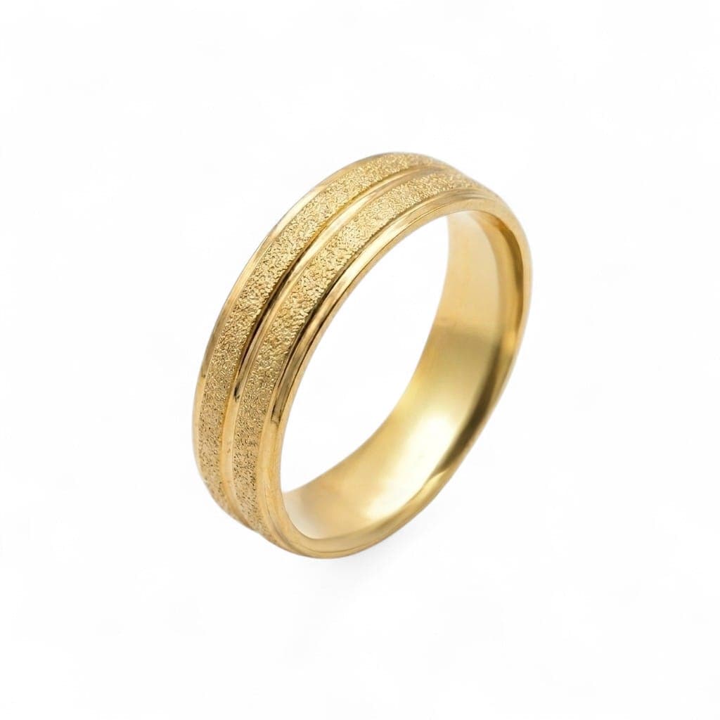 A unisex gold-tone ring, crafted from durable stainless steel, featuring a brilliant shine and sparkling details for an attractive look. Perfect for engagements and special occasions! Women's Rings