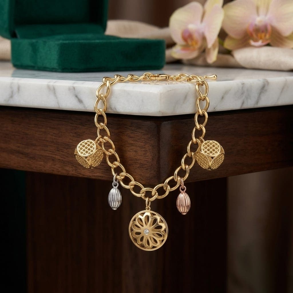 An elegant gold bracelet, sparkling with charming hollow cube and circular pendants interspersed with drops in silver and pink, with an adjustable clasp to suit you. Women's Bracelets & Bangles (٤)