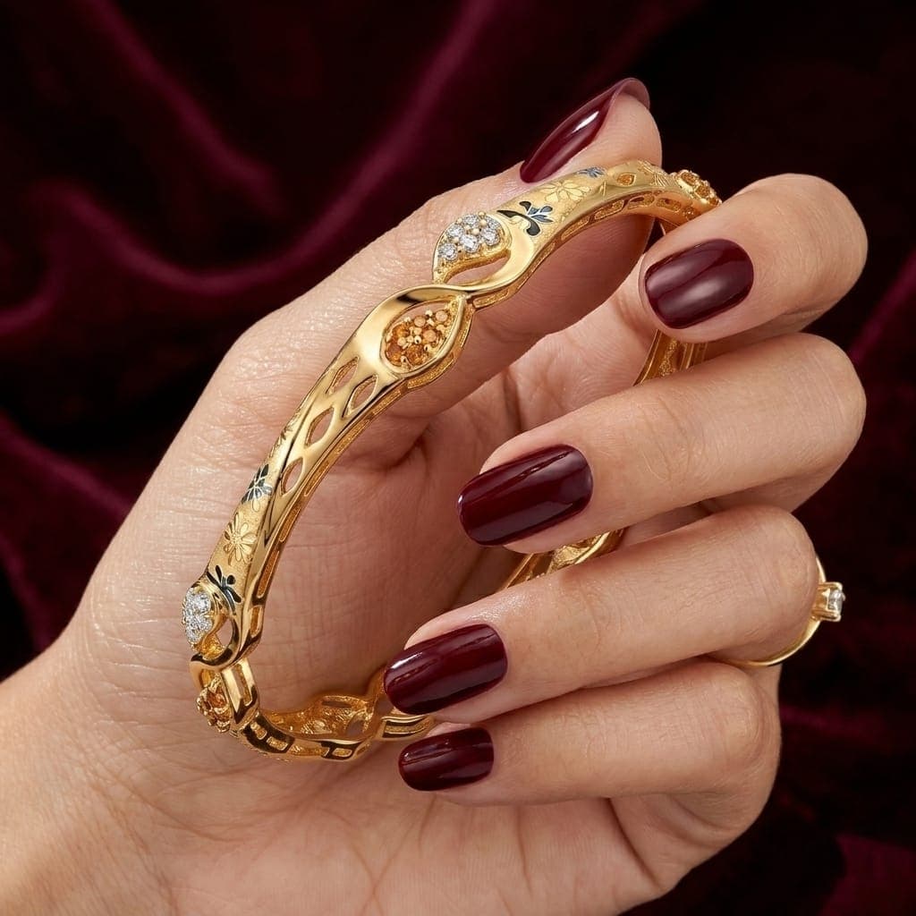 An elegant gold bracelet with a distinctive design that blends luxury and simplicity. Adorned with sparkling zircon stones and delicate engravings, it adds a touch of beauty to your look. Women's Bangles (5)