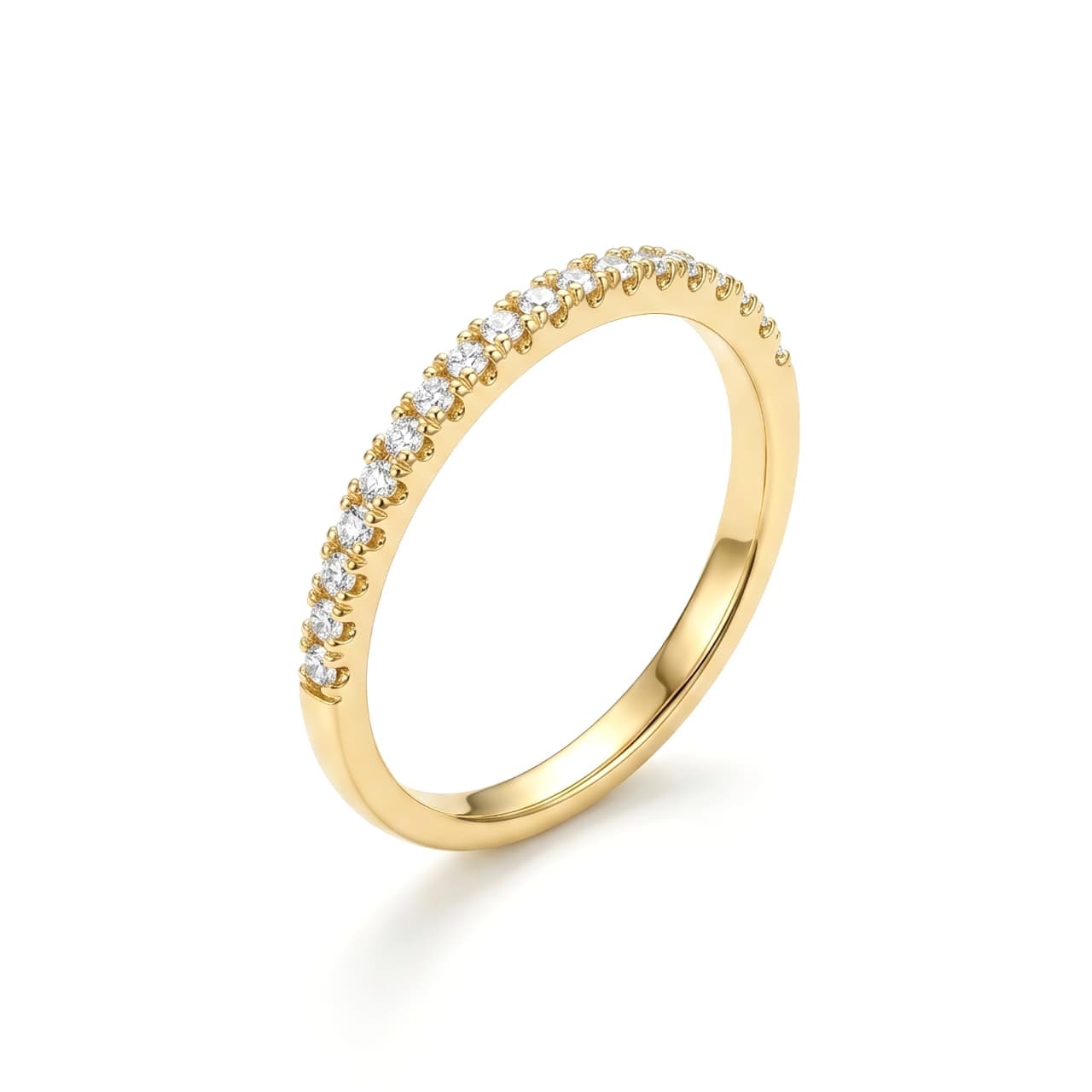 An elegant gold ring with a delicate and refined design, adorned on the front with a row of sparkling, micro-stones. A subtle piece that accentuates your femininity and complements your everyday look with ease. Women's Rings