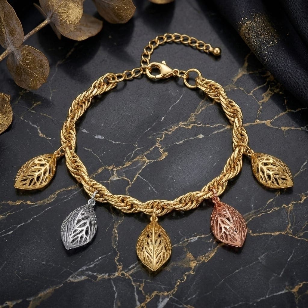 An elegant gold bracelet, with a braided chain adorned with 5 hollow leaf pendants in three attractive colors (gold, silver, rose gold) with an adjustable clasp to suit you. Women's Bracelets & Bangles (٦)