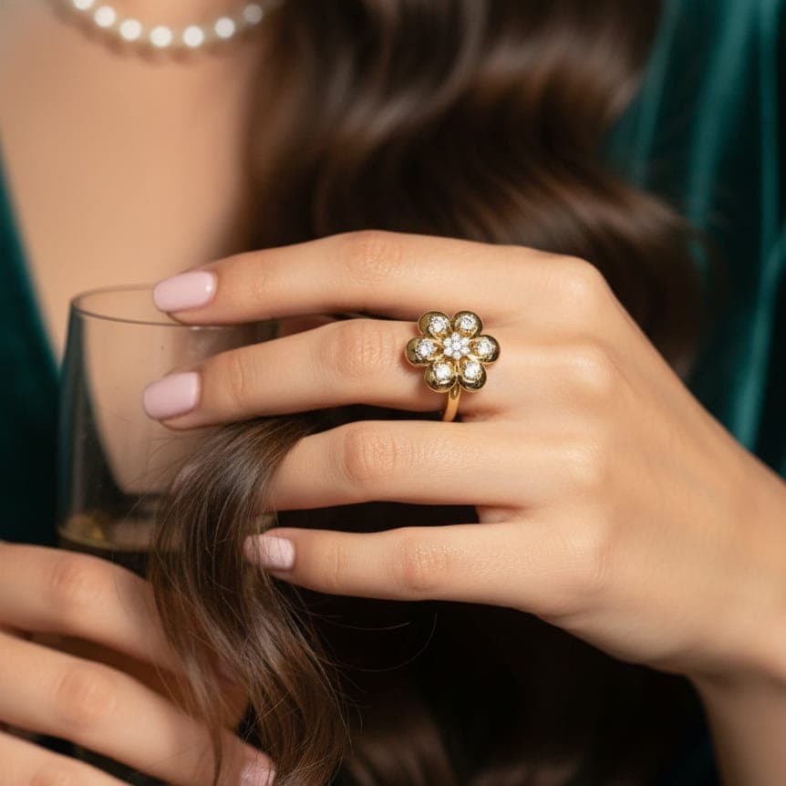 A luxurious gold ring with an elegant flower design, studded with sparkling zircon stones, an open design to ensure a fit for all sizes. Women's Rings (3)