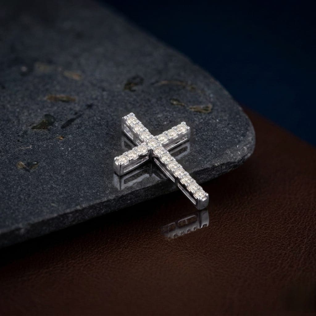 A cross pendant (without chain) in elegant silver, featuring a double row of precisely arranged zircon stones, to give you exceptional sparkle and an attractive modern touch. Women's Necklaces (5)