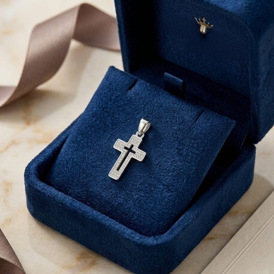 A cross pendant (without chain) in elegant silver, featuring a hollow design in the middle and heavily studded with zircon stones, combining luxury and unique modern beauty. Women's Necklaces (٦)