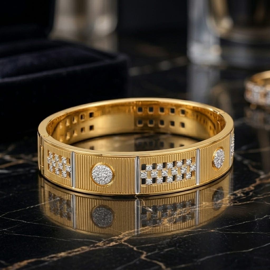 A luxurious bracelet in elegant gold, featuring intricate geometric patterns and adorned with sparkling zircon stones. A design that adds a touch of glamour to your look. Women's Bangles (٦)