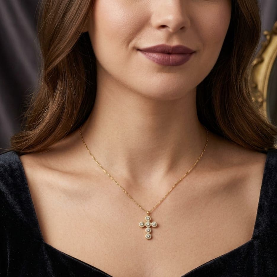 A cross pendant (without chain) in elegant gold, featuring a unique design of circles fully studded with sparkling zircon stones, giving you a luxurious and attractive look. Women's Necklaces (٤)