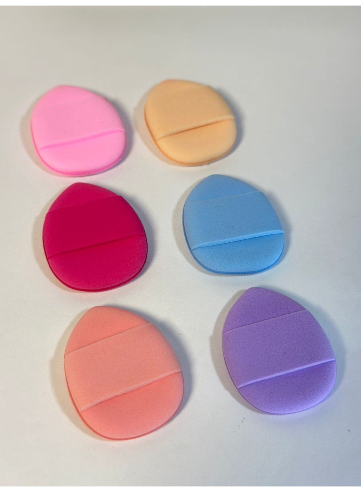 6-piece mini puff powder finger set with a teardrop design; soft and ideal for blending concealer and setting powder under the eyes and in tight corners; washable. Make Up Sponges (٣)