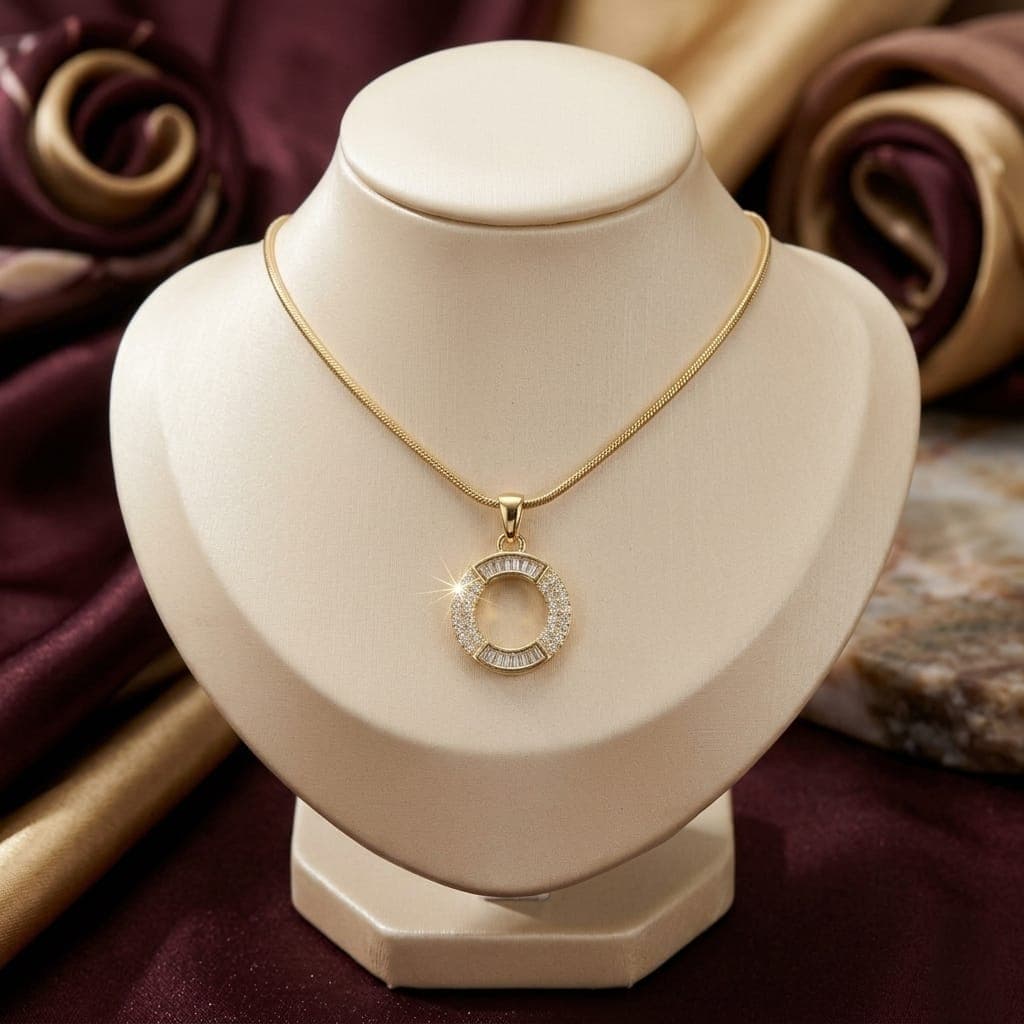 A luxurious, elegant gold necklace with a sumptuous letter O pendant studded with sparkling baguette and zircon stones, and an adjustable clasp to fit you. Women's Necklaces (٦)