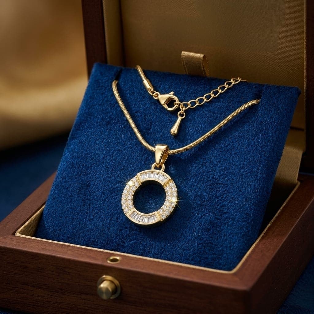 A luxurious, elegant gold necklace with a sumptuous letter O pendant studded with sparkling baguette and zircon stones, and an adjustable clasp to fit you. Women's Necklaces (٧)