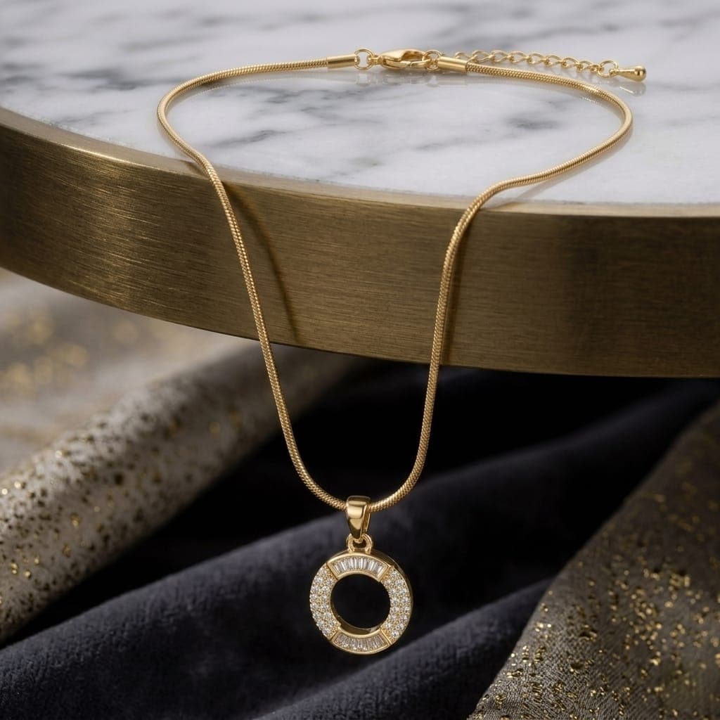 A luxurious, elegant gold necklace with a sumptuous letter O pendant studded with sparkling baguette and zircon stones, and an adjustable clasp to fit you. Women's Necklaces (٤)