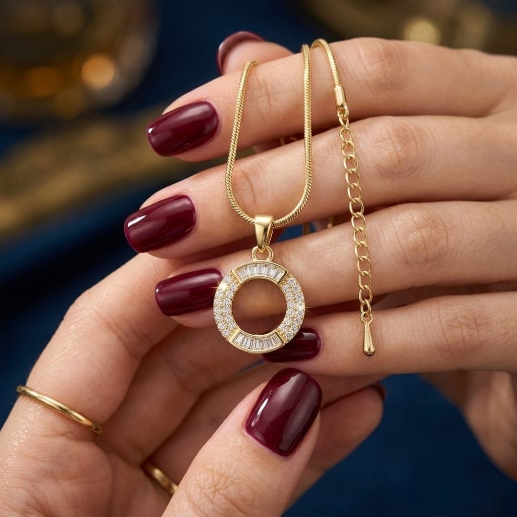 A luxurious, elegant gold necklace with a sumptuous letter O pendant studded with sparkling baguette and zircon stones, and an adjustable clasp to fit you. Women's Necklaces (٥)