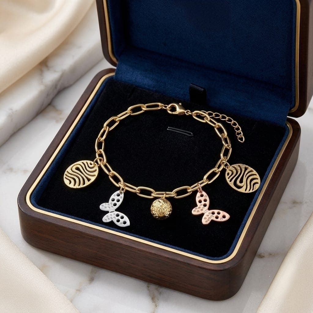 An elegant gold bracelet with luxurious clasp rings adorned with silver and pink butterfly pendants and attractive gold-colored hollow shapes, with an adjustable clasp to suit you. Women's Bracelets & Bangles (٧)
