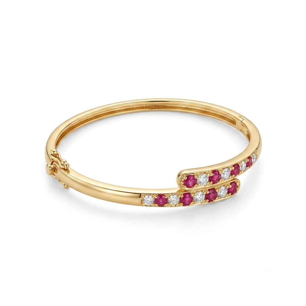 A luxurious bracelet in elegant gold, with a secure side locking mechanism, studded with alternating rows of round gemstones in red and white in a sophisticated design. Women's Bangles (2)