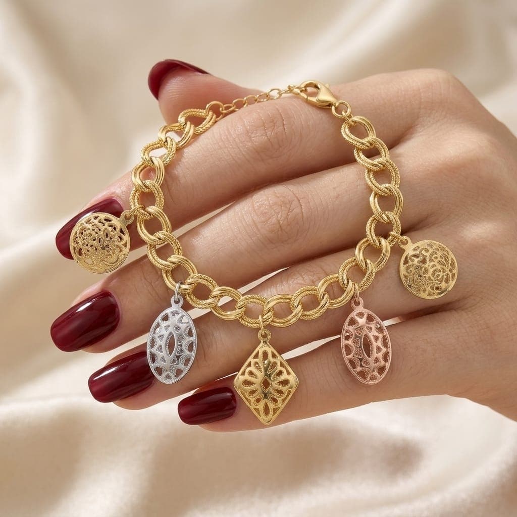 An elegant gold bracelet, sparkling with charming openwork pendants in gold, silver and pink; to add a modern and luxurious touch to your look, with an adjustable clasp to suit you. Women's Bracelets & Bangles (4)