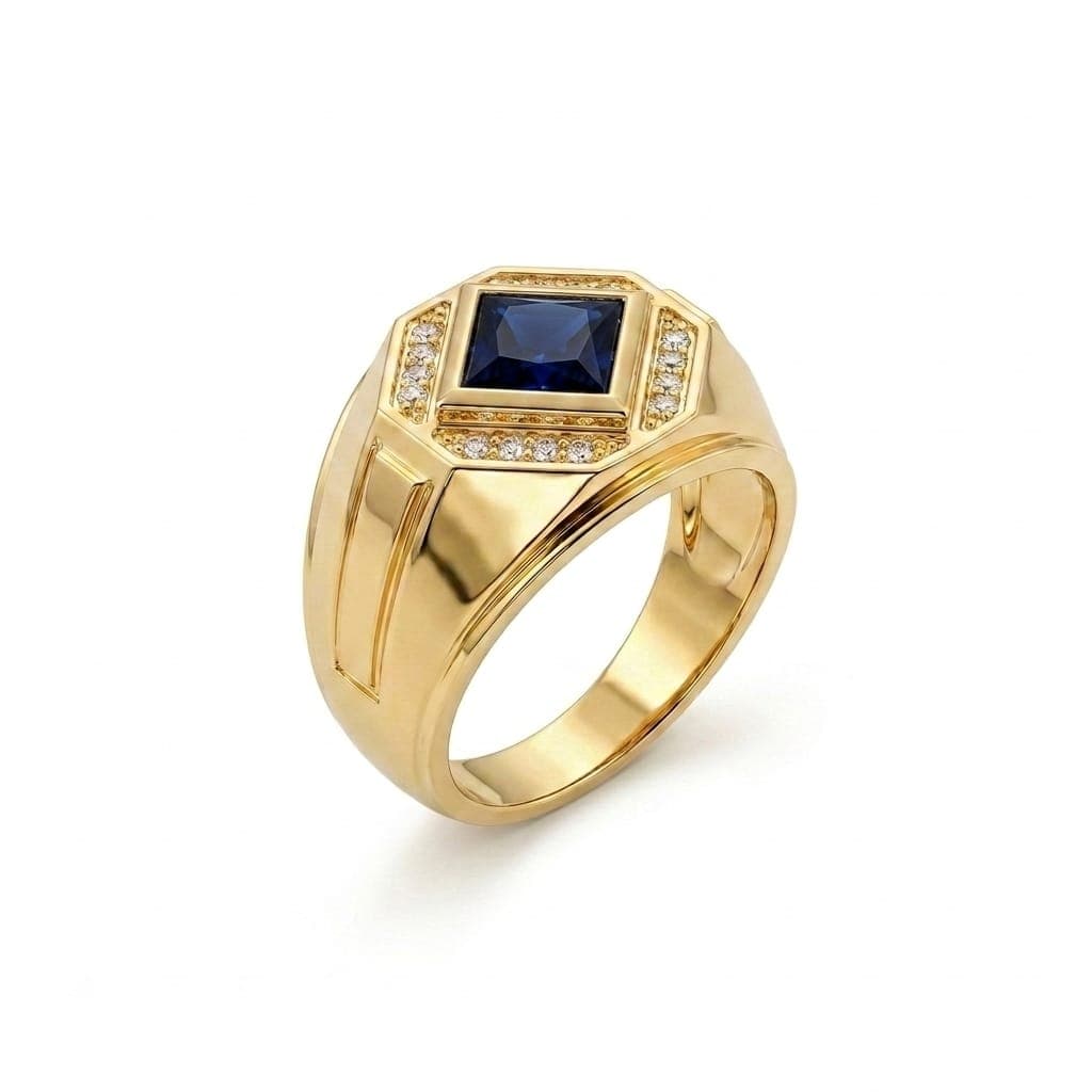 A luxurious gold men's ring, featuring a royal blue stone in the center, surrounded by sparkling zircon stones. A design that combines prestige and modern elegance to suit your distinctive presence.